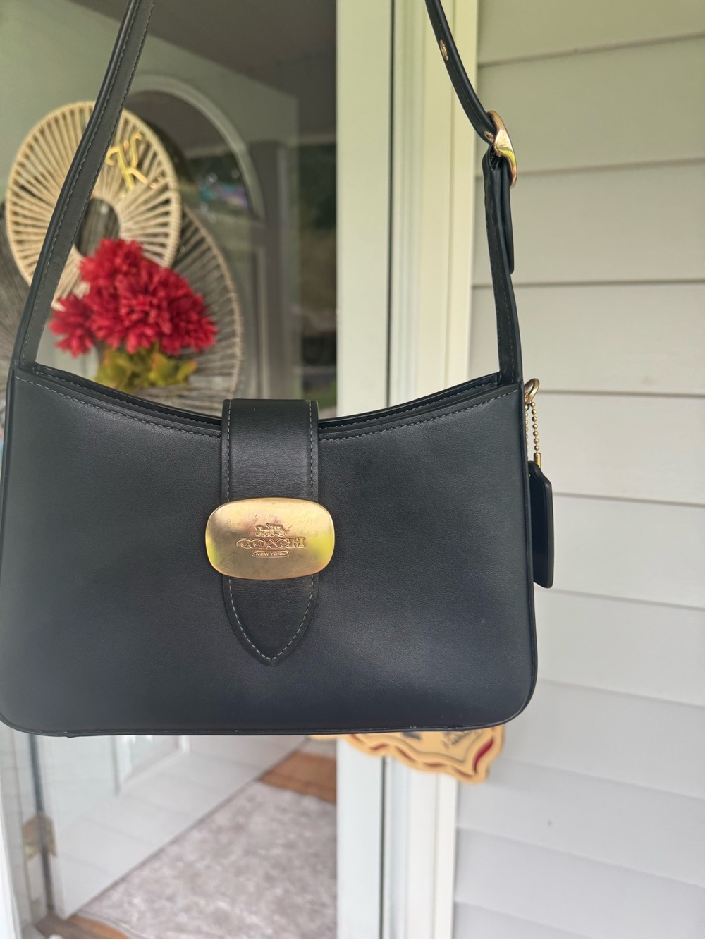 Coach Black Leather Shoulder Bag with Gold-Tone Plaque